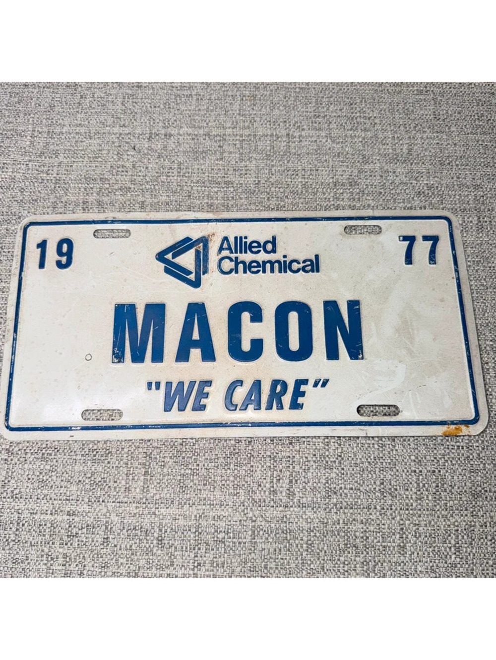 Vintage 1977 Macon Georgia Allied Chemical “We Care” Booster License Plate Tag